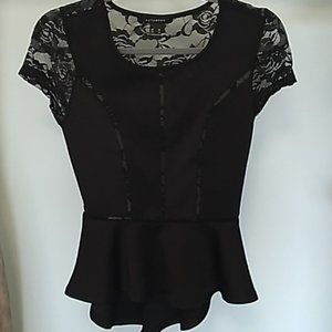 Revamped black multi media paneled peplum top with lace sheer